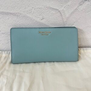 Kate Spade: Large Slim Bifold Wallet Cameron Seaside (323)